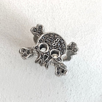 FLAT PAVE SKULL-CROSSED BONES RING